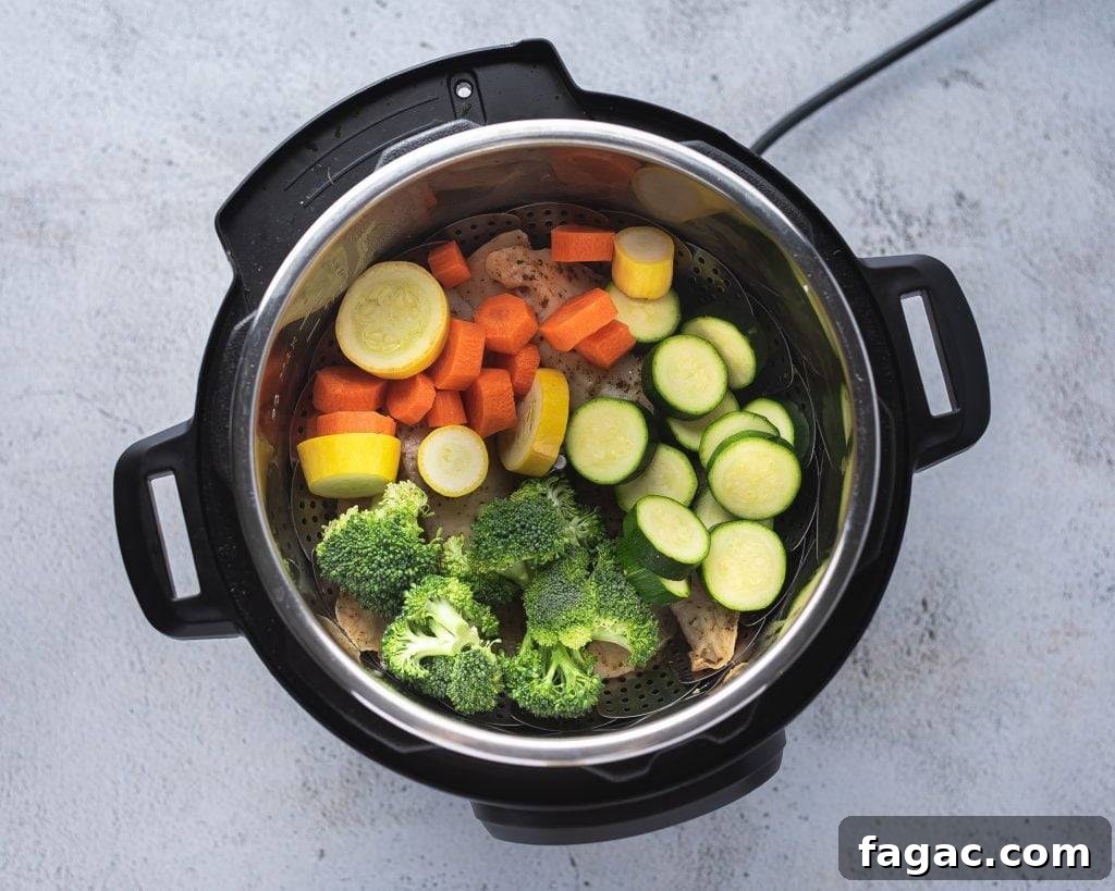 instant pot filled with fresh chopped vegetables