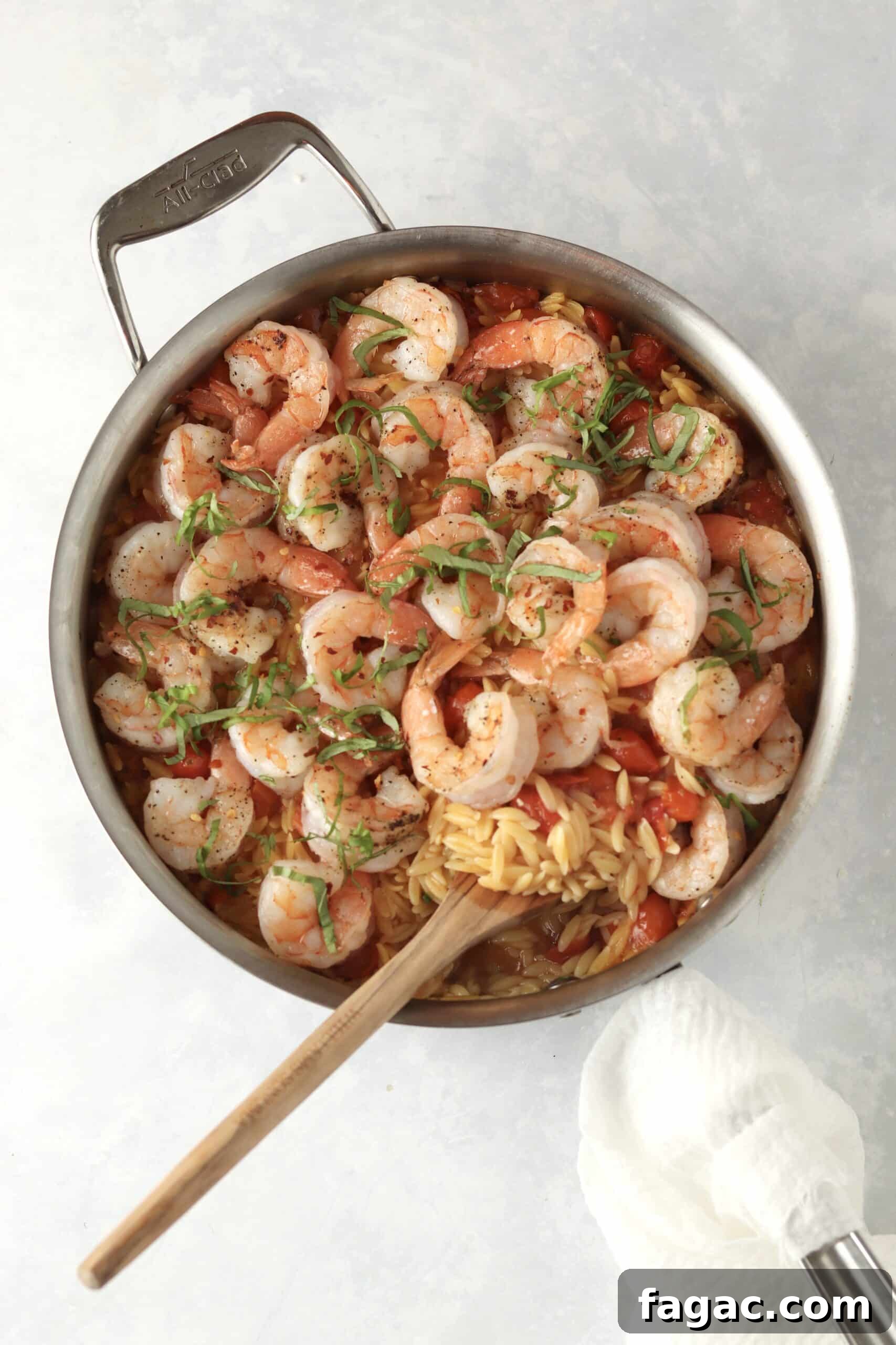 One-Pot Shrimp and Tomato Orzo with Garlic and Basil 8 one pot shrimp and orzo in a deep sauté pan.