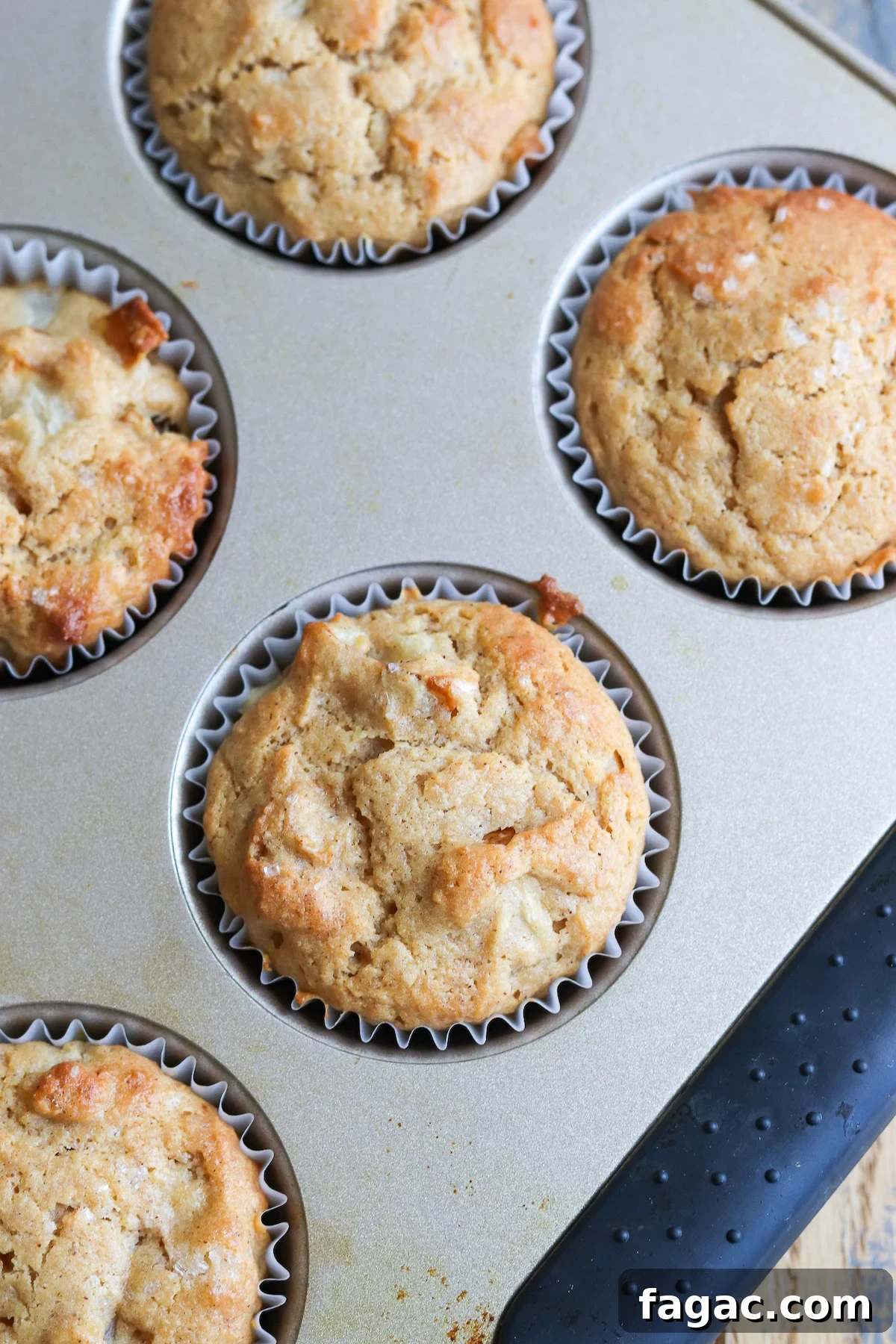 Closeup of a rich and buttery tasting pear muffin just out of the oven. 