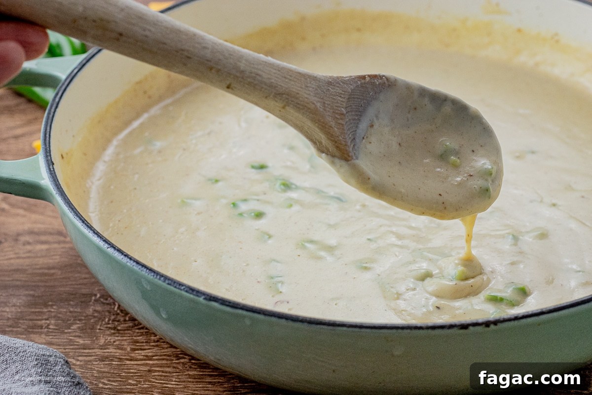 Jalapeño Popper Macaroni and Cheese Recipe 6 thicken sauce made with milk and jalapenos
