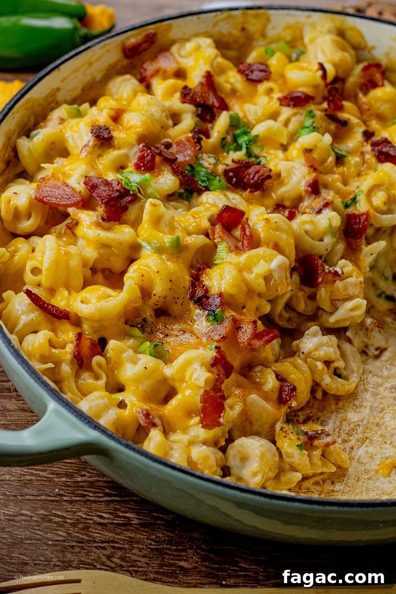 Jalapeño Popper Macaroni and Cheese Recipe 9 close up view of bacon jalapeno mac and cheese in a large pan