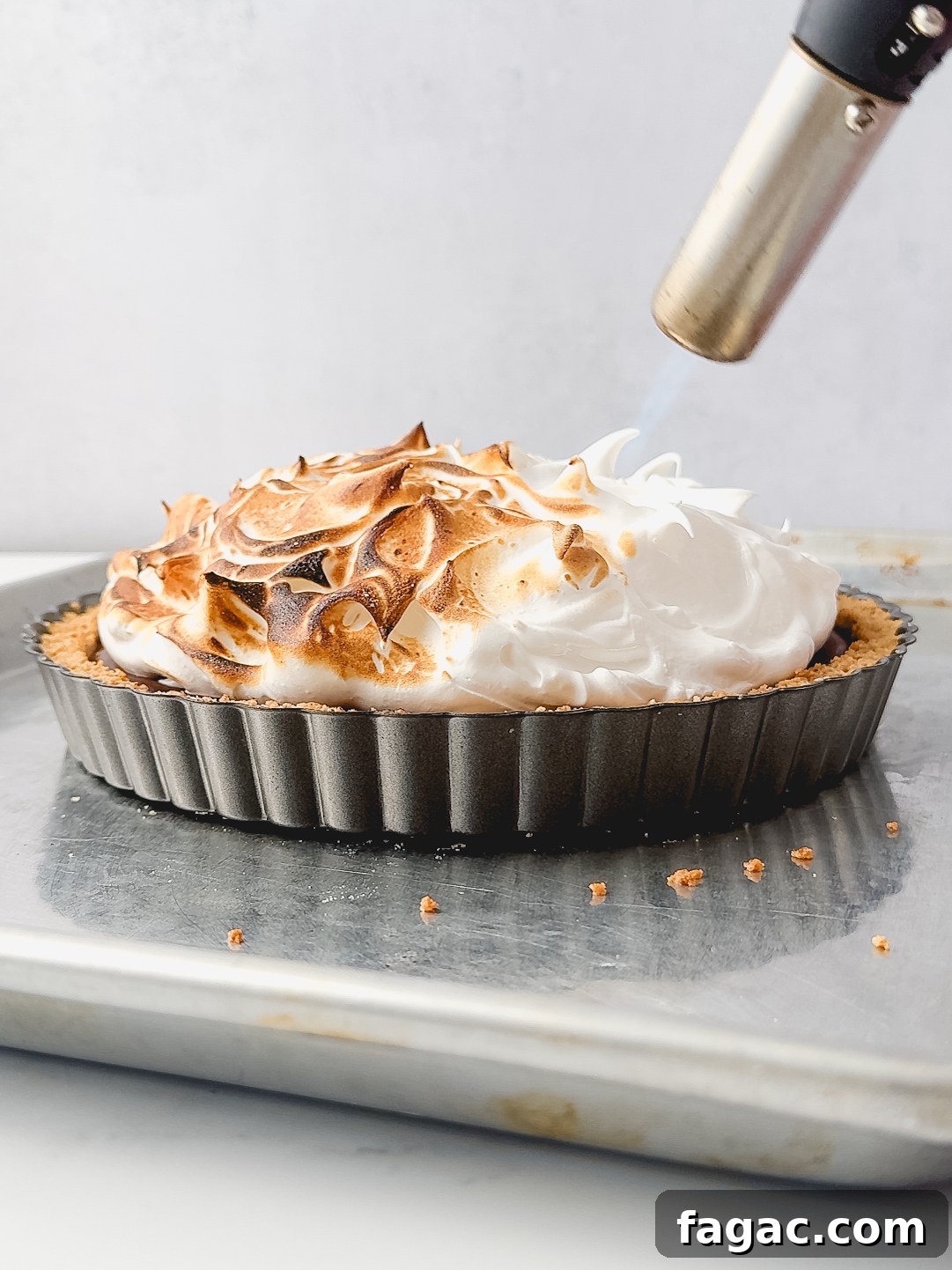 Salted Caramel S'mores Tart Recipe: Gooey Graham Cracker Dessert 8 Torching meringue