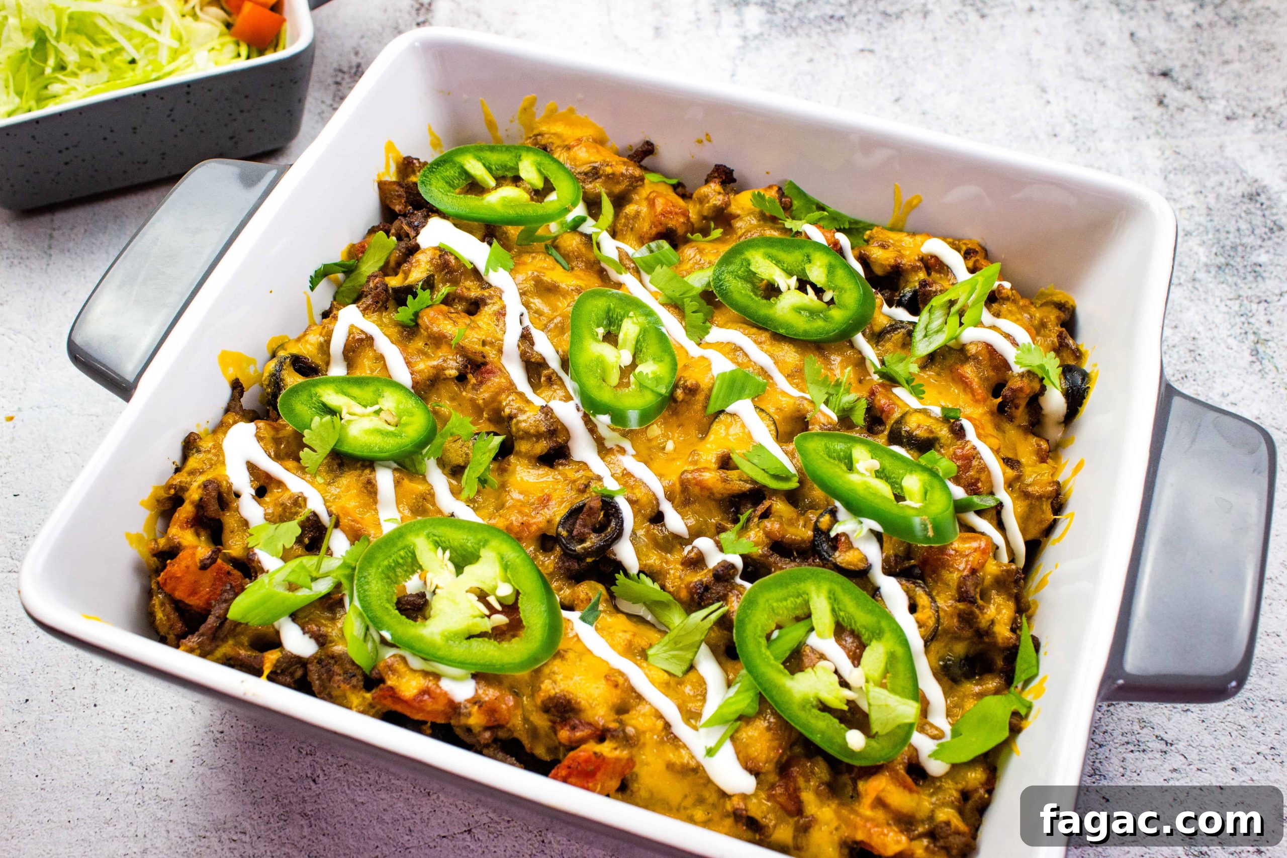 23 Classic Casseroles That Taste Like Grandma’s Comfort Cooking 21 A Taco Casserole dish with black beans, cheese and jalapenos.