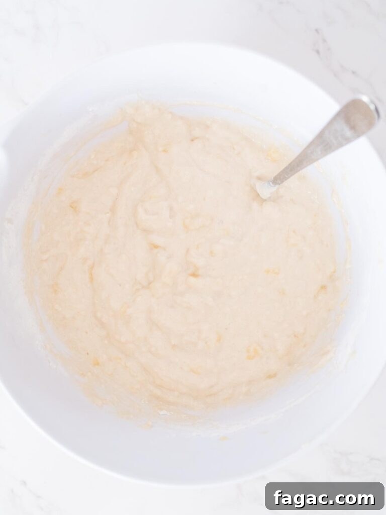 banana muffin batter in a mixing bowl