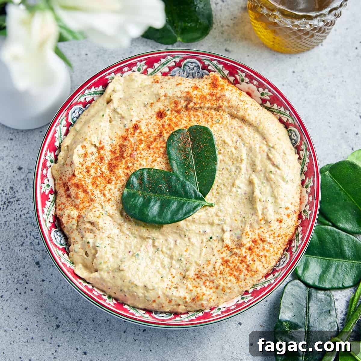 Square overhead photo of vegan whipped feta and pistachio dip.