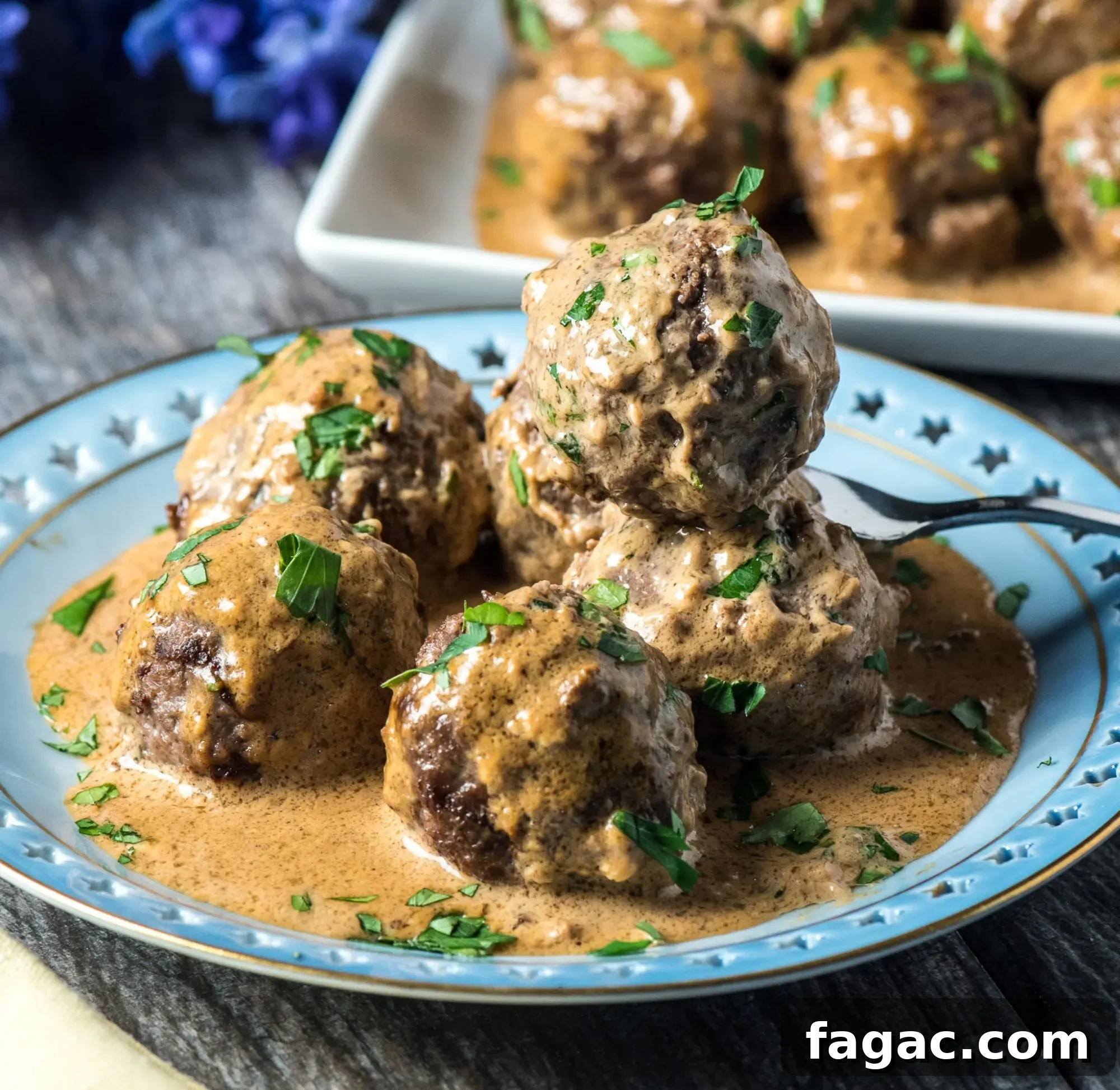 Low-Carb Swedish Meatballs in Creamy Sauce 8 Vertical extreme closeup meatball