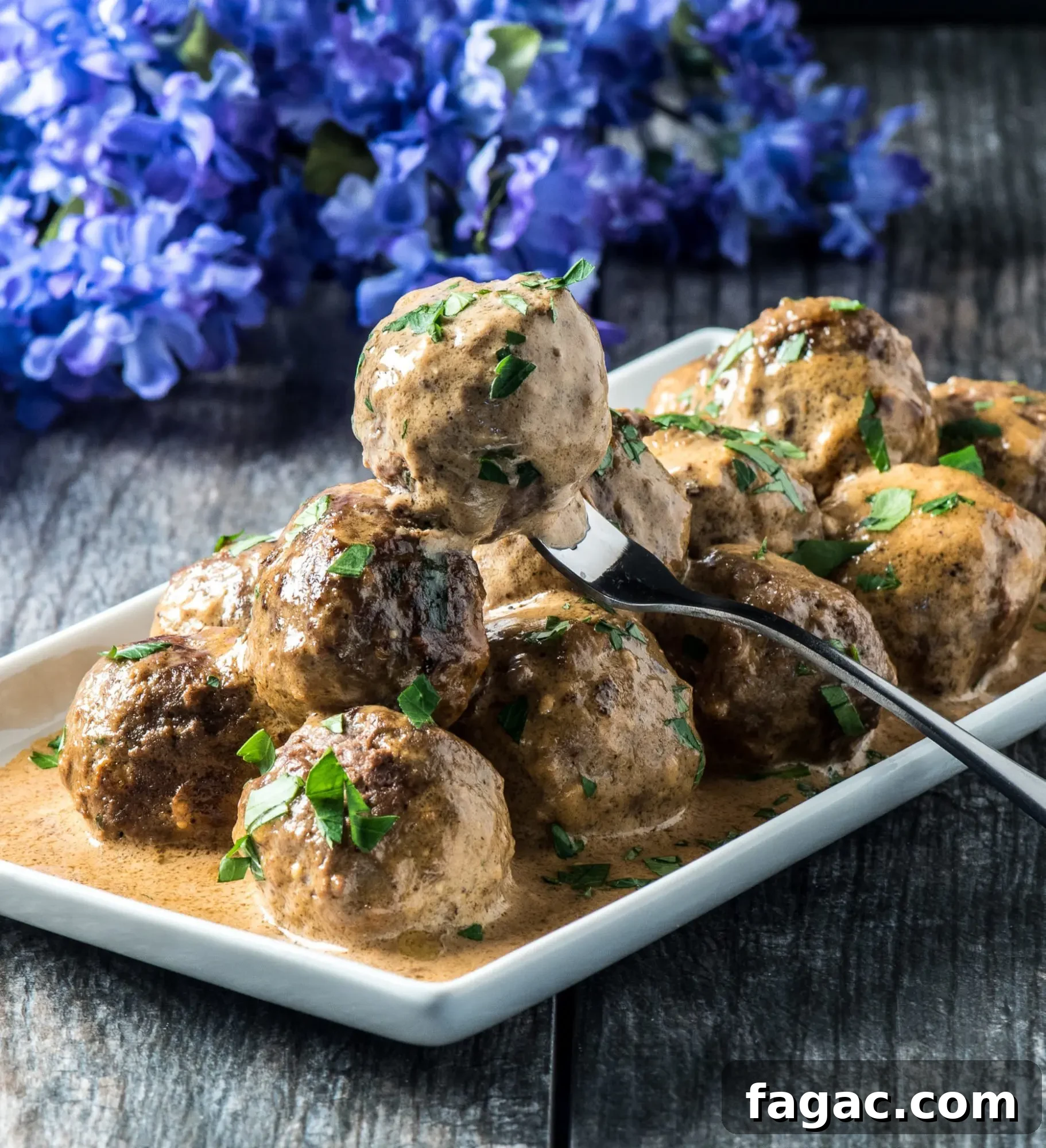 Low-Carb Swedish Meatballs in Creamy Sauce 6 Meatball on fork