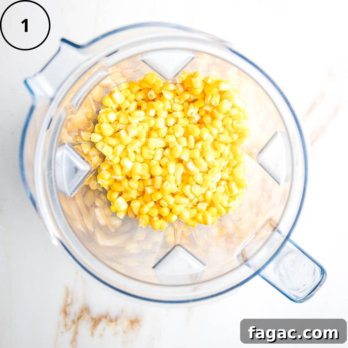 Gluten-Free Vegan Cornbread Made with Pureed Corn Kernels 4 Corn inside the pitcher of a blender.