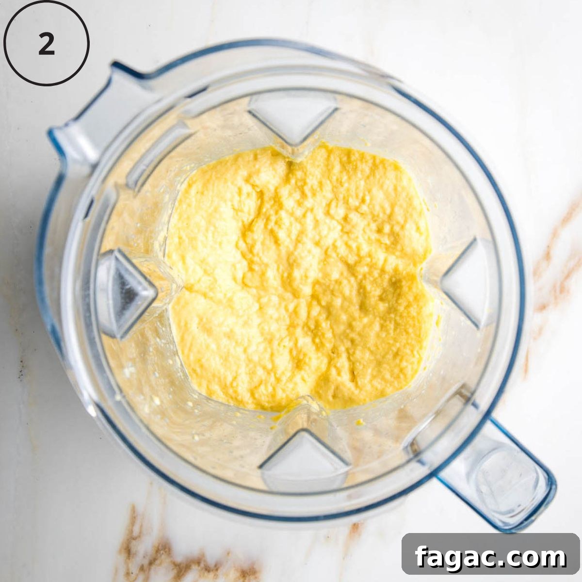 Gluten-Free Vegan Cornbread Made with Pureed Corn Kernels 5 Mushy corn mixture in a blender.