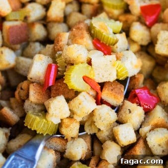 Easy One Pot Turkey Stuffing or Dressing in Large Spoon- Closeup Shot.