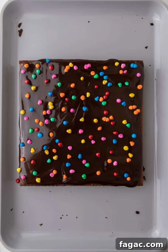 Ultimate Cosmic Brownies Recipe for Perfect Fudgy Squares 14 ganache on a baked dessert