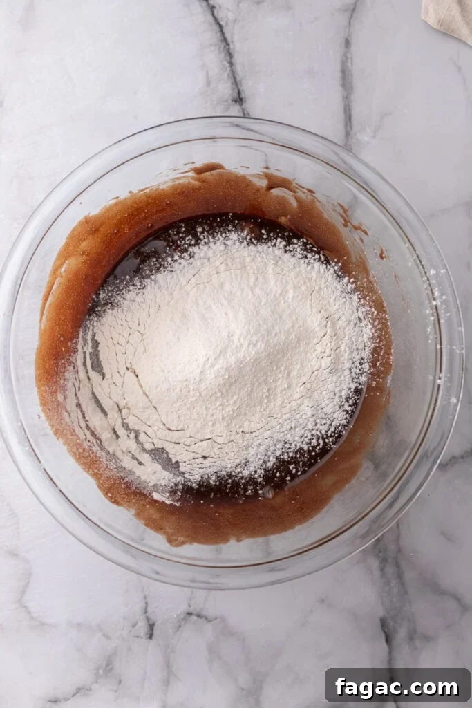 Ultimate Cosmic Brownies Recipe for Perfect Fudgy Squares 8 unmixed ingredients in a bowl