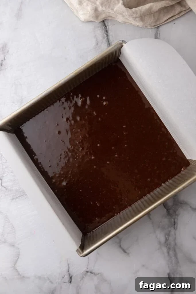 Ultimate Cosmic Brownies Recipe for Perfect Fudgy Squares 10 batter in a pan