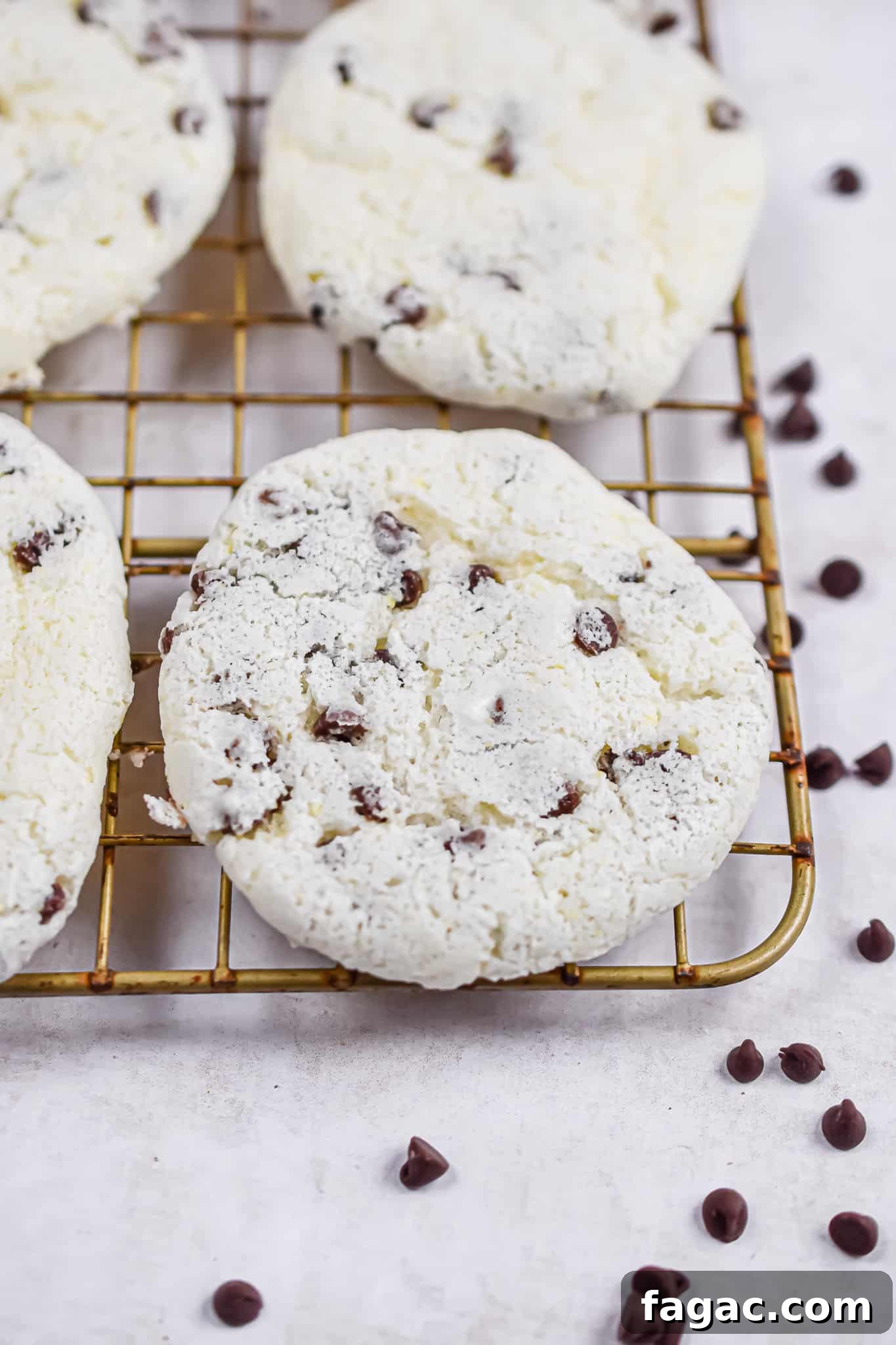 Fluffy Chocolate Chip Cookies Made with Angel Food Cake Mix 4 A close up of the angel food cake mix cookies on a wire rack.