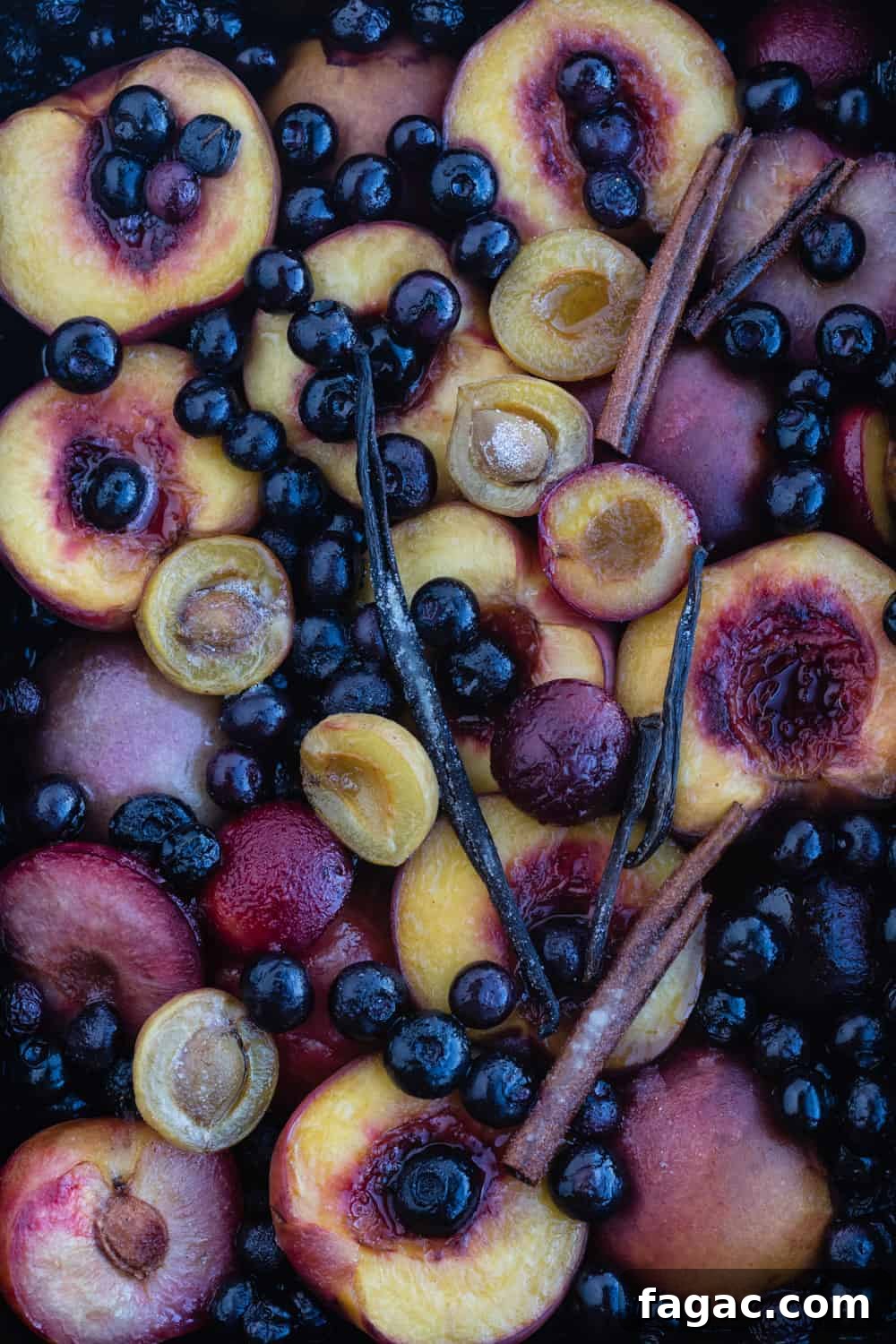 Cooked stone fruit! stone fruit and blueberries just out of the oven, overhead shot.