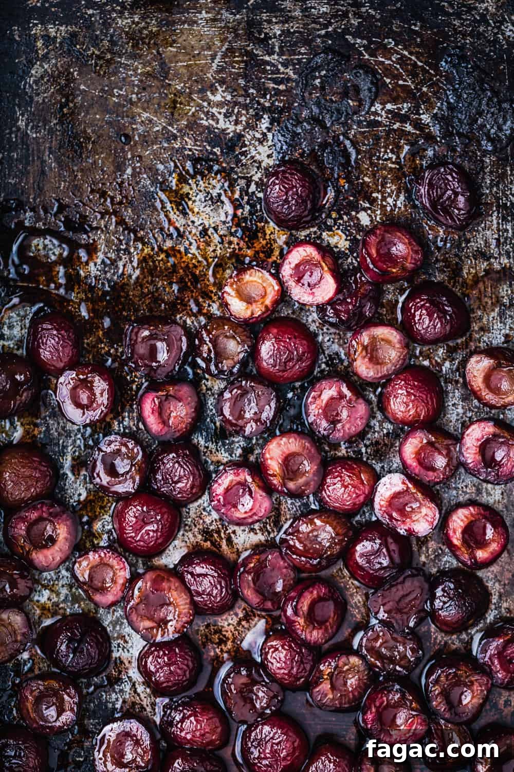 cooked cherries all done! overhead shot of the roasted cherries just out of the oven.