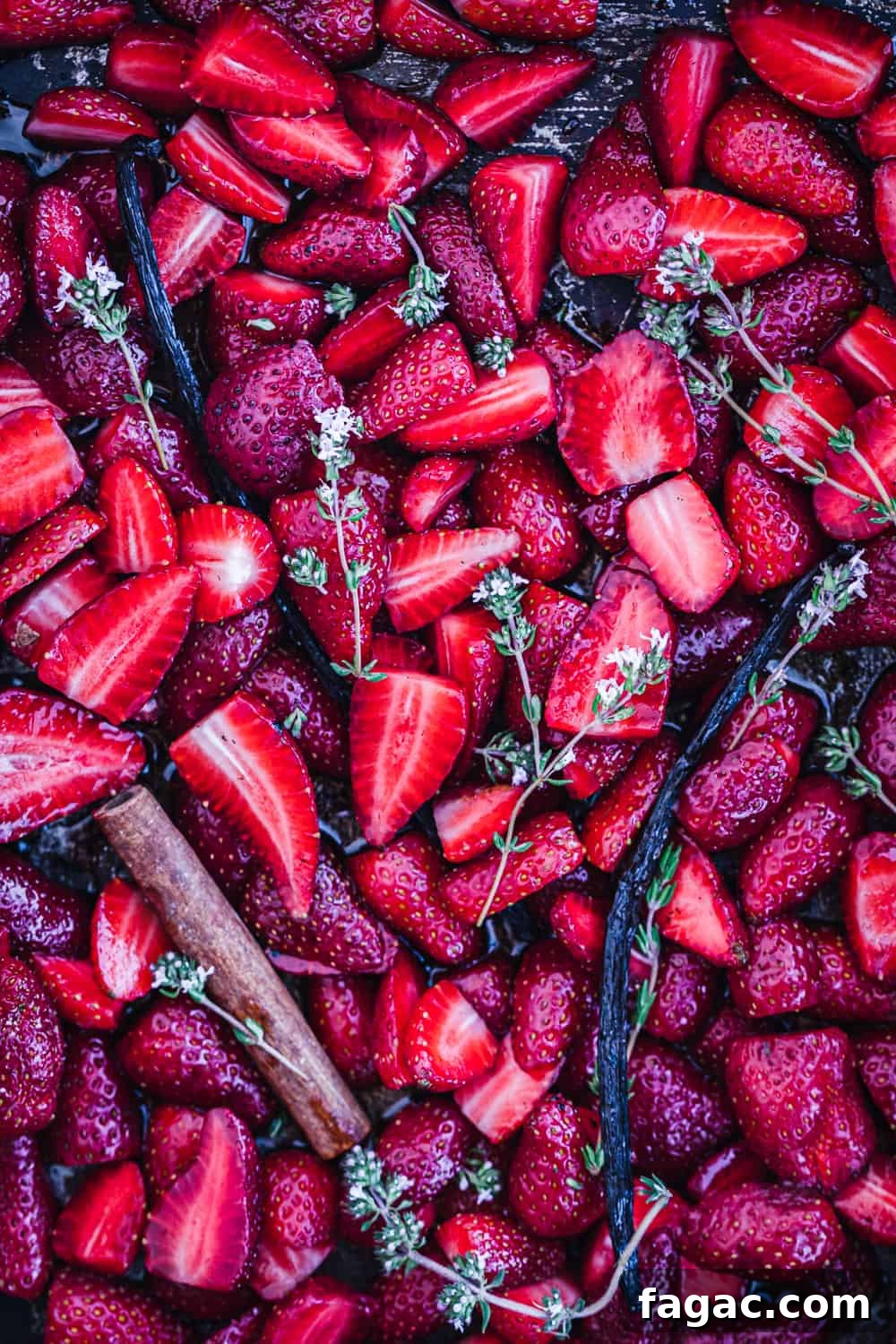 prep shot of raw strawberries on a tray all ready to go in the oven and be cooked!