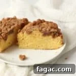 Single serve coffee cake with streusel topping on a small plate.