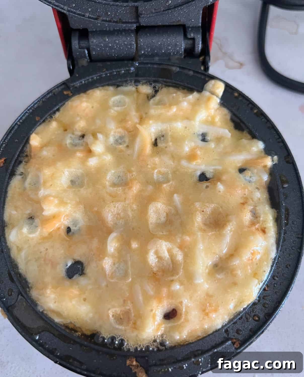 Keto Chaffle Recipes: 3 Delicious Ways to Make Them 5 Chaffle batter in mini dash waffle maker.