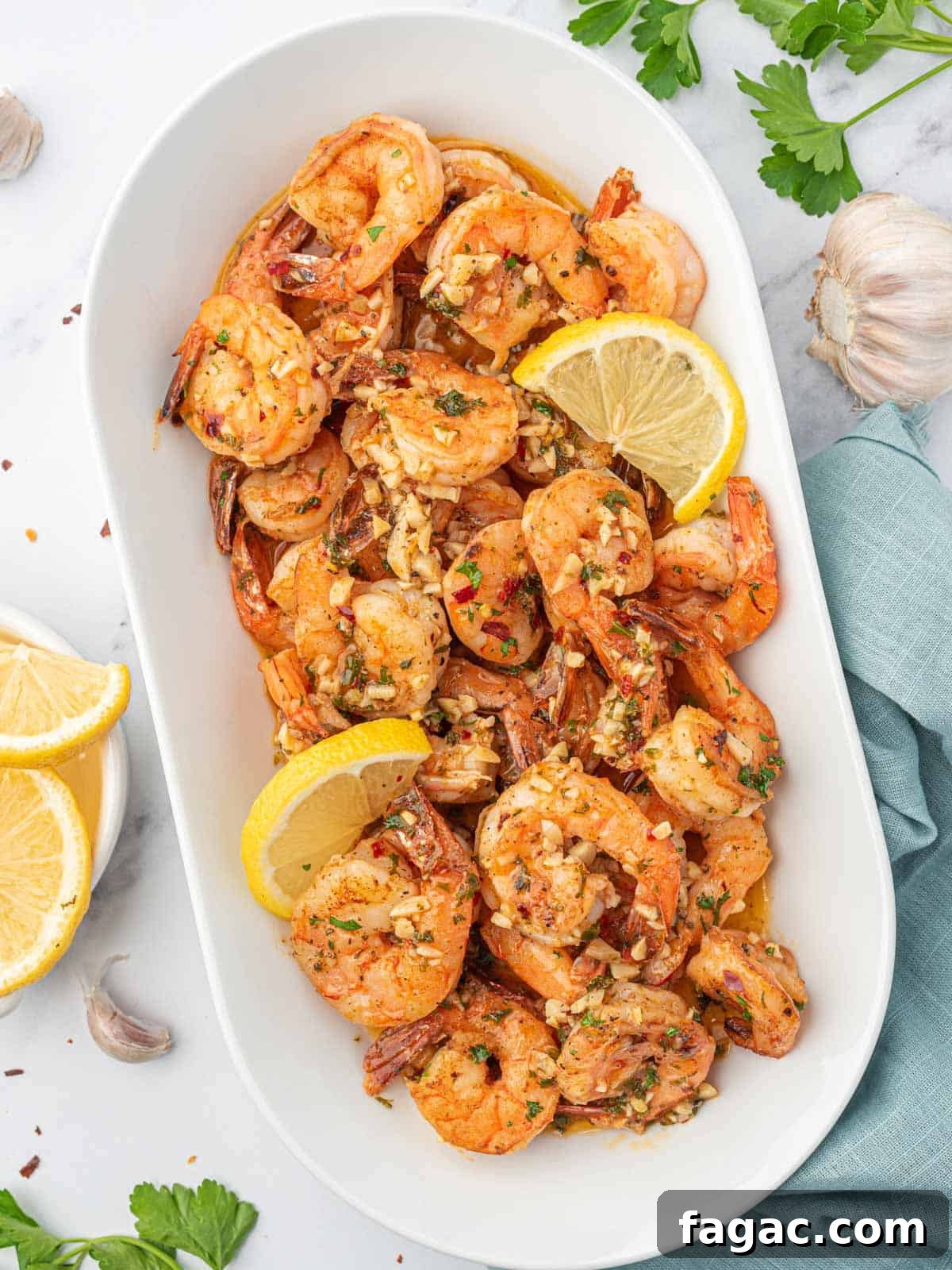 A large tray of garlic and lemon shrimp.