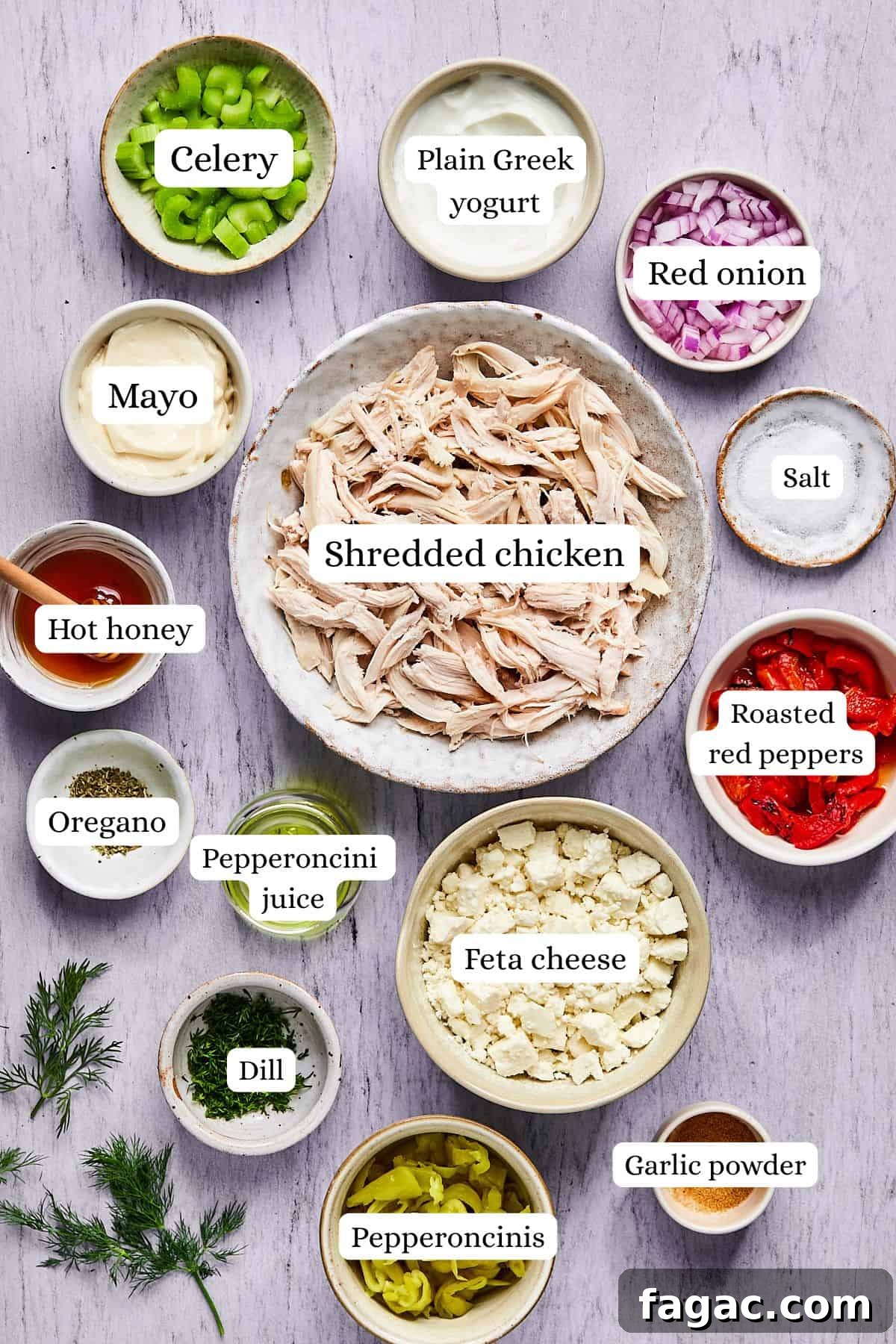 ingredients for feta chicken salad in nesting bowls