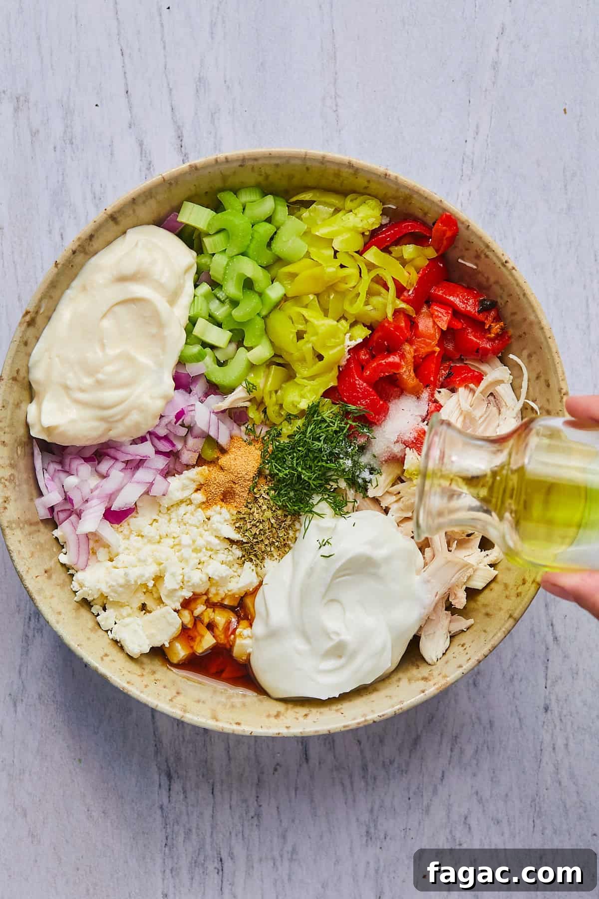 ingredients for chicken salad in a bowl before mixing