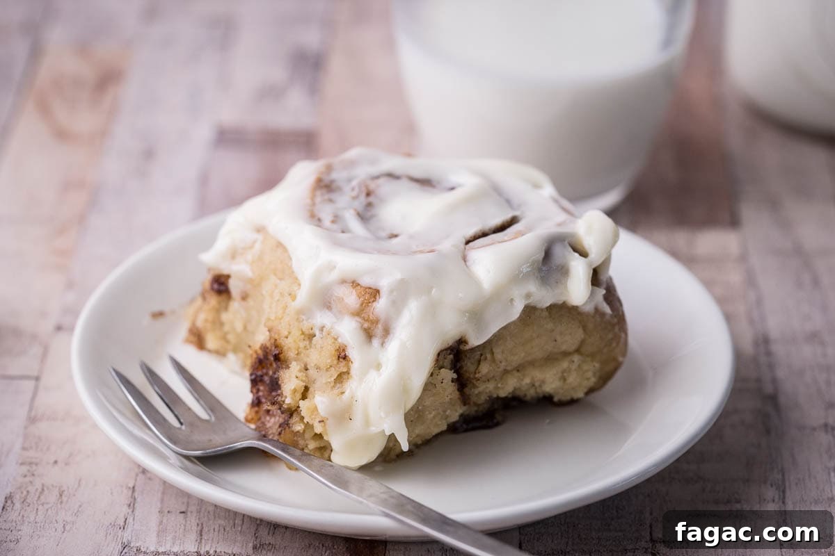 Soft and Fluffy Gluten-Free Cinnamon Rolls Without Xanthan Gum 3 Gluten-Free Cinnamon Roll on a plate.