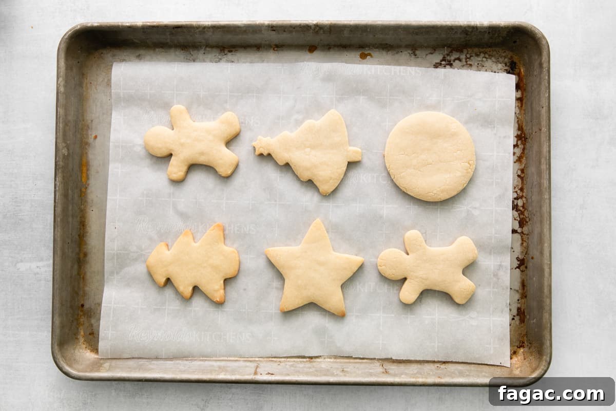 christmas cookies on a baking sheet.