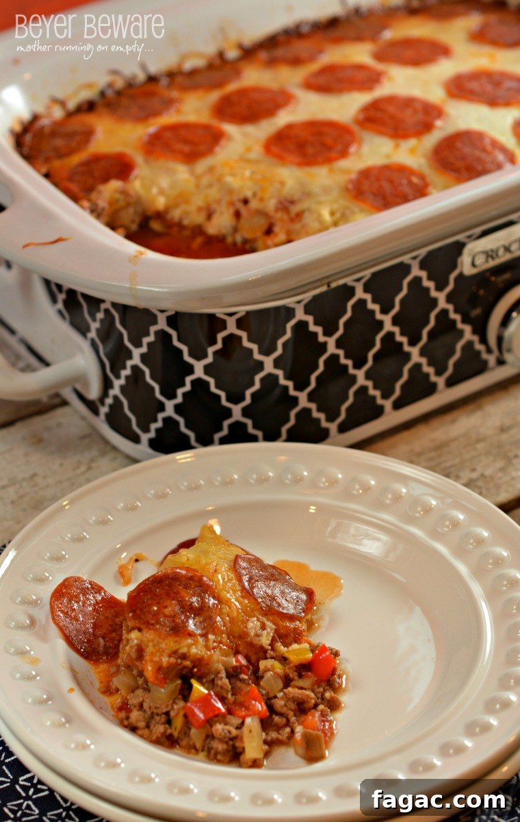 Low Carb Crock Pot Pizza Casserole Recipe is the perfect weeknight meal for families who are on the go and need dinner ready when they get home.