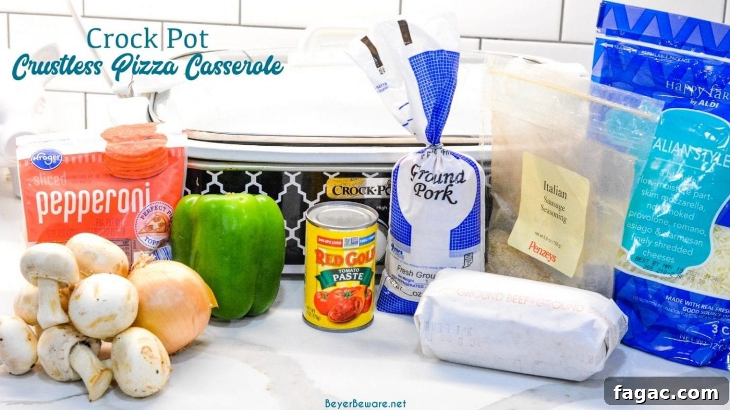 This low carb crock pot pizza casserole is a new favorite pizza recipe even for the folks not eating low-carb since it is full of a lot of meat, cheese, and flavor no one misses the crust or pasta in this crustless pizza casserole.