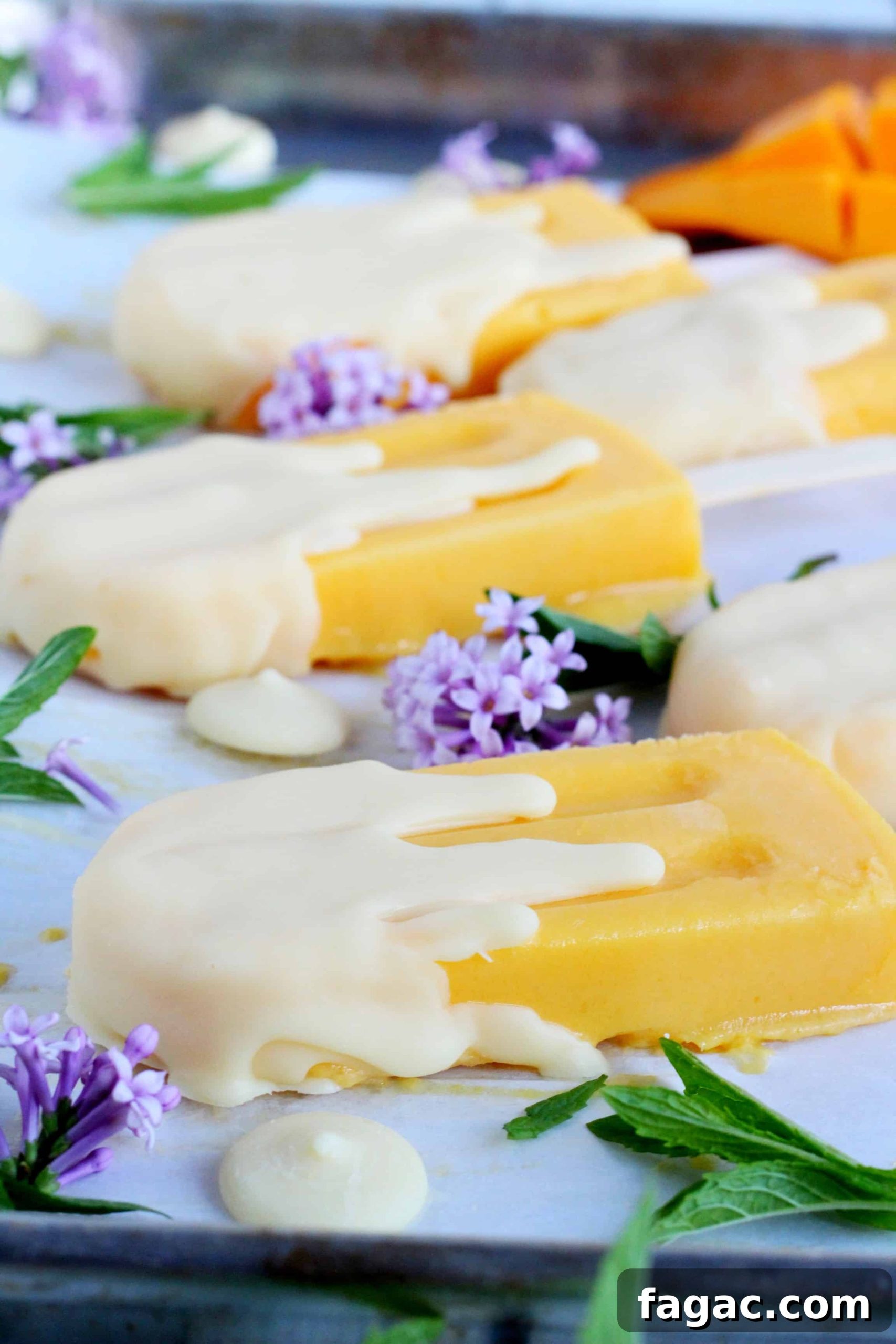 White Chocolate Dipped Mango Popsicles 3 mango popsicles 5