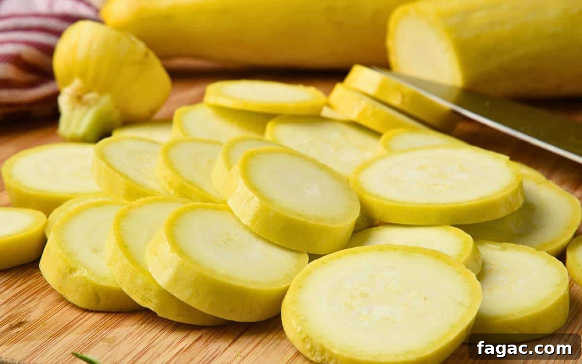 Freeze Summer Squash: Preserve Flavor and Texture 3 Sliced yellow squash on a wooden cutting board, with a knife and whole yellow squash in the background. Learn how to freeze summer squash to preserve its fresh flavor for longer.