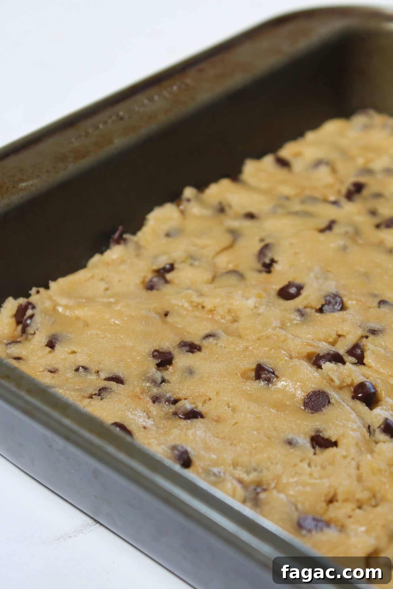 Salted Caramel Chocolate Chip Cookie Bars Recipe & Tips 11 Salted Caramel Chocolate Chip Cookie Bars recipe featured by top US cookie blog, Practically Homemade