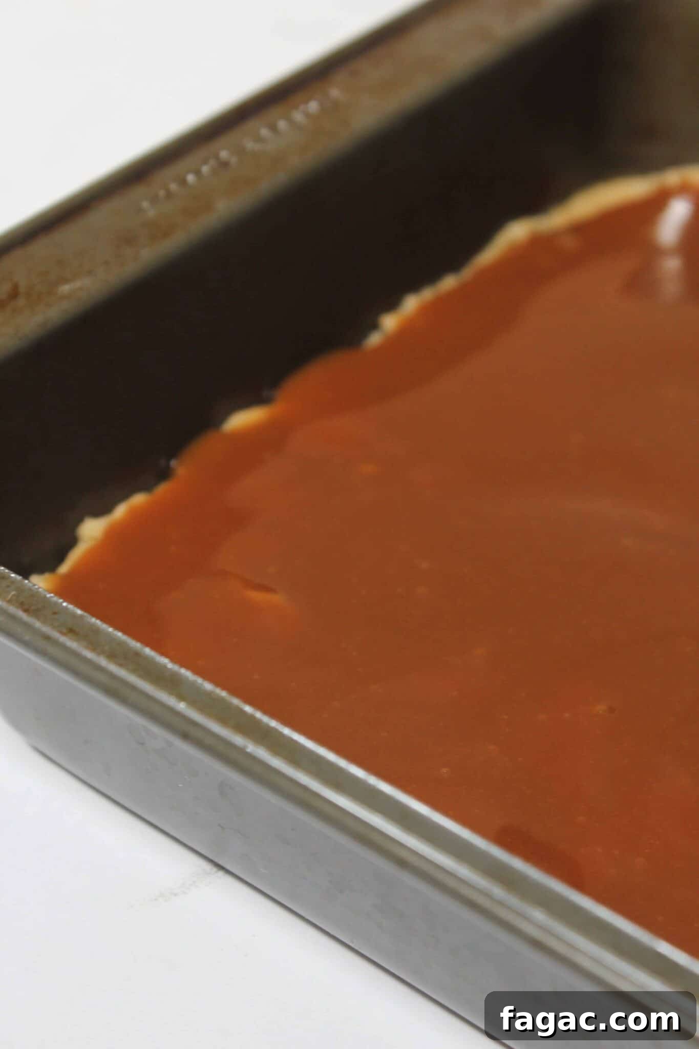 Salted Caramel Chocolate Chip Cookie Bars Recipe & Tips 9 Salted Caramel Chocolate Chip Cookie Bars recipe featured by top US cookie blog, Practically Homemade