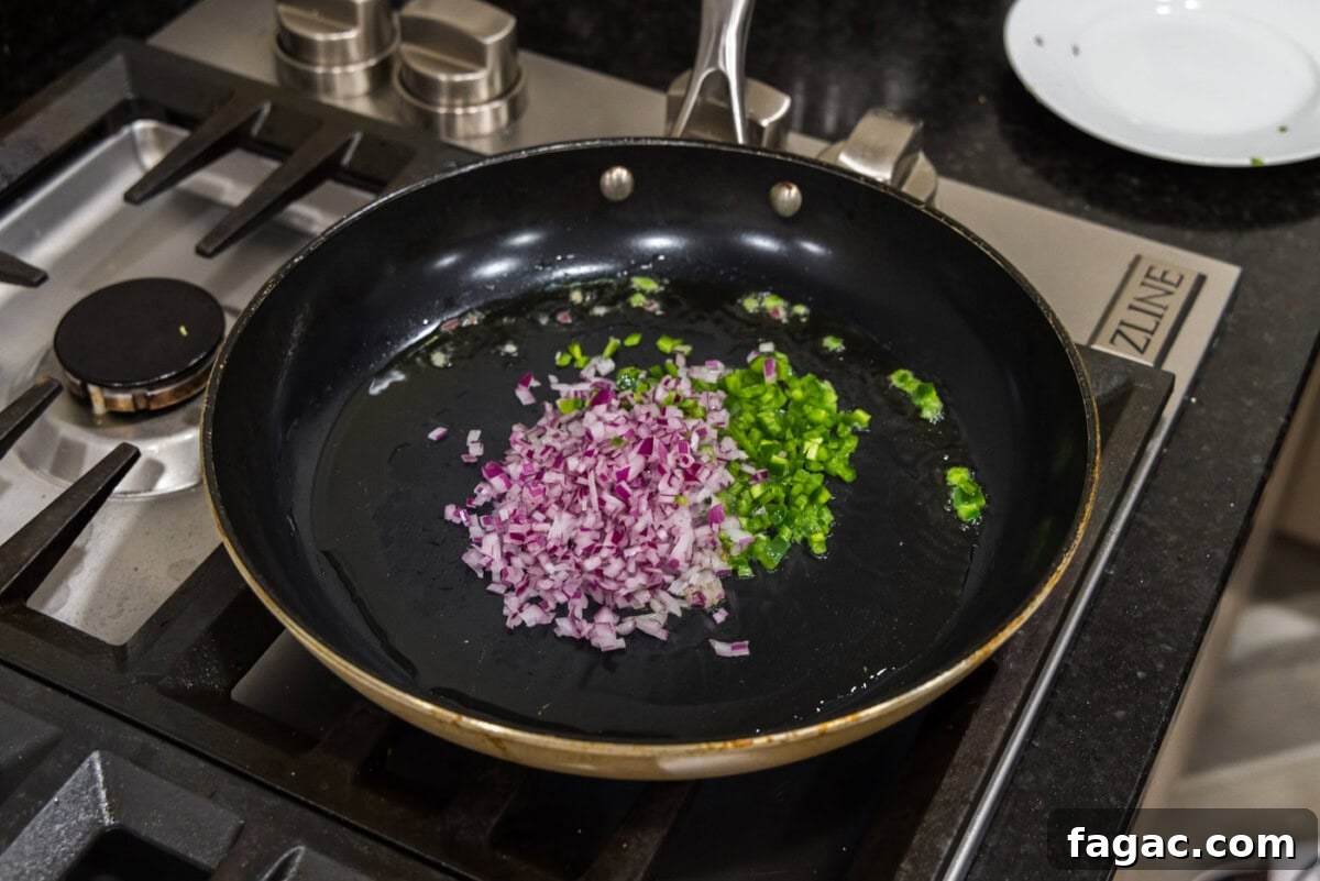 Buffalo Burger Recipe with Blue Cheese and Crispy Onions 5 chopped onion and jalapeno peppers in a skillet with oil