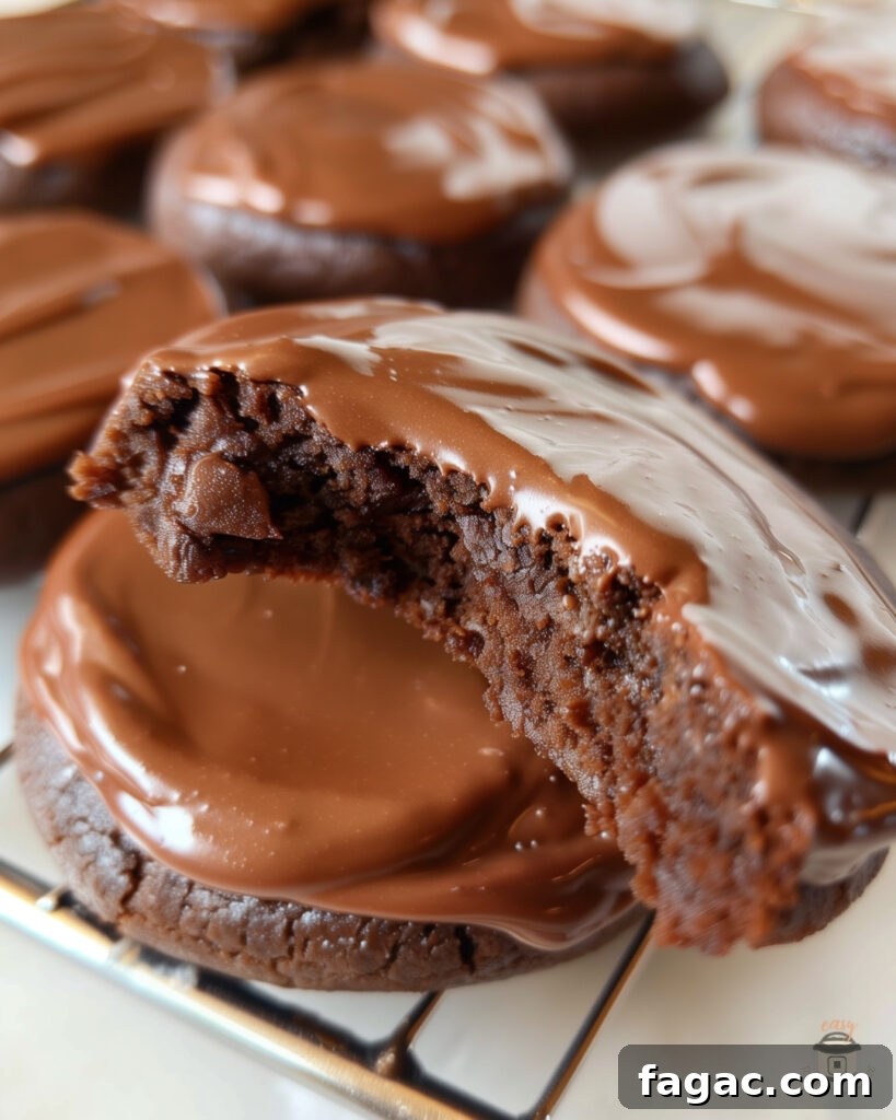 Texas Sheet Cake Cookies Recipe & Baking Tips 3 Baked Texas Sheet Cake Cookies arranged on a baking sheet, showcasing their moist texture and glossy chocolate topping.
