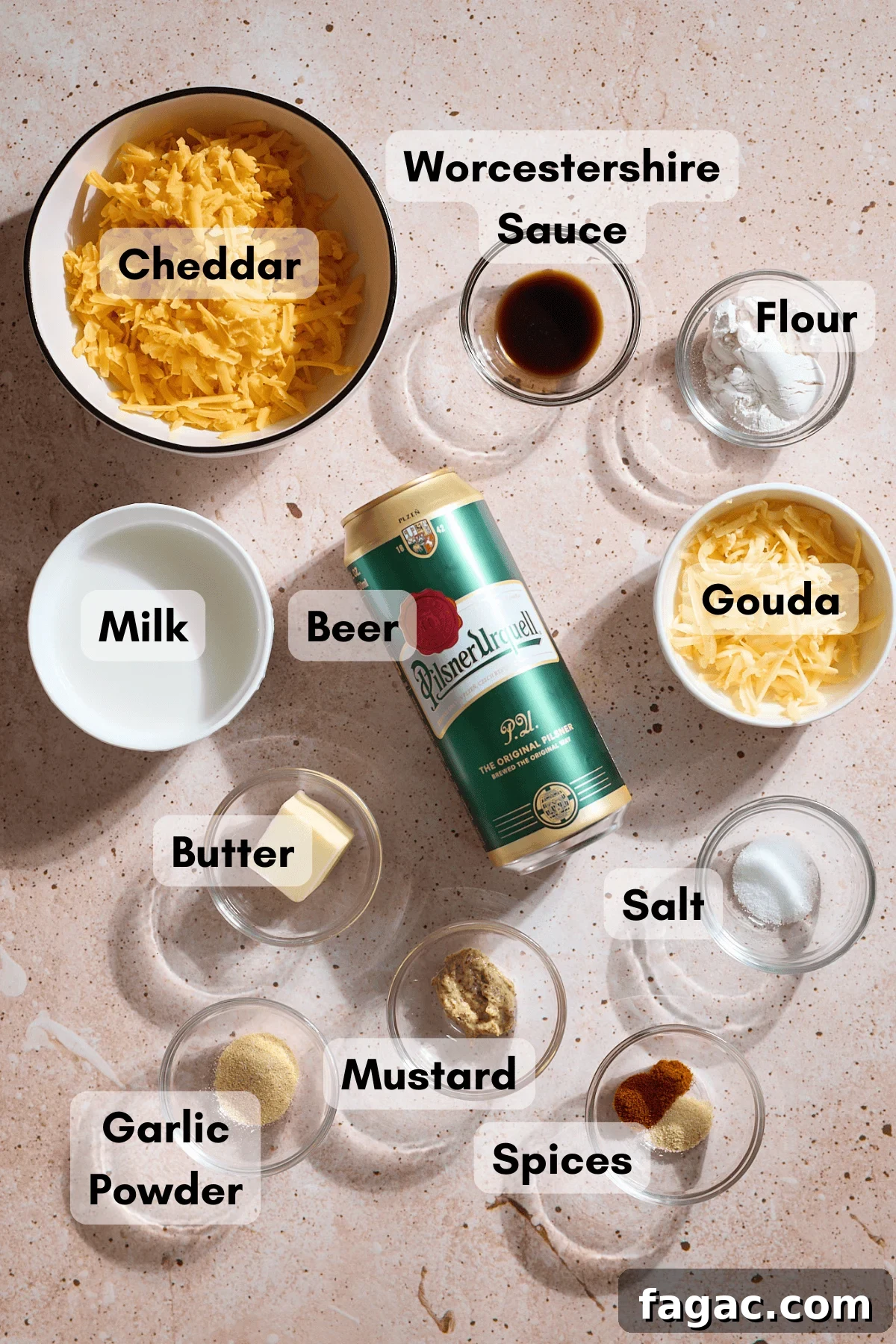 Creamy Beer Cheese Dip for Soft Pretzels 3 Ingredients for Beer Cheese dip in small bowls.