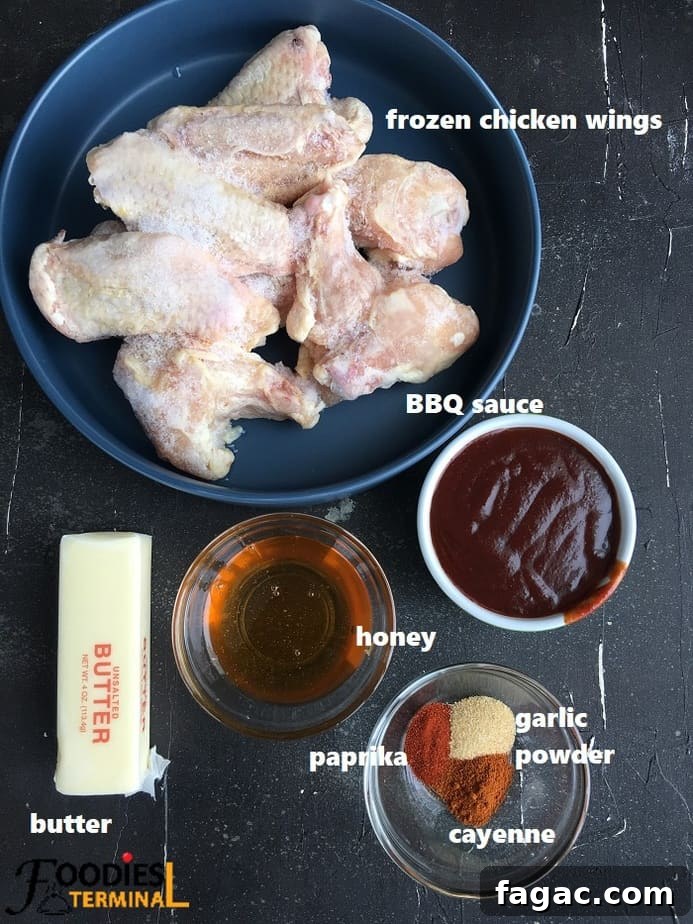 Sticky BBQ Chicken Wings in the Instant Pot 4 recipe ingredients on a black surface