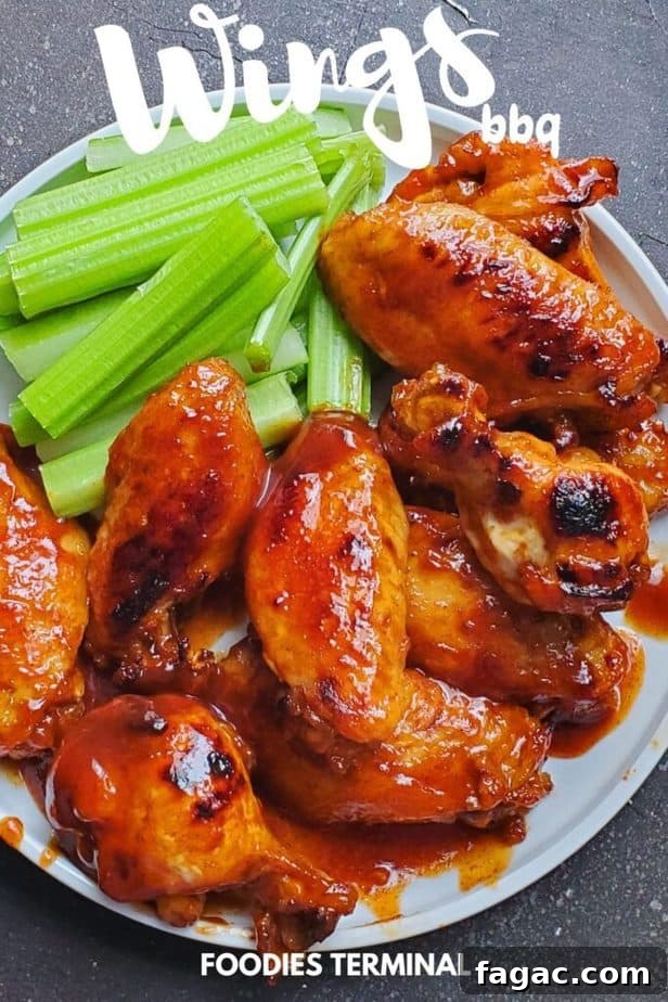 Sticky BBQ Chicken Wings in the Instant Pot 7 instant pot bbq chicken wings served with celery sticks on a white plate