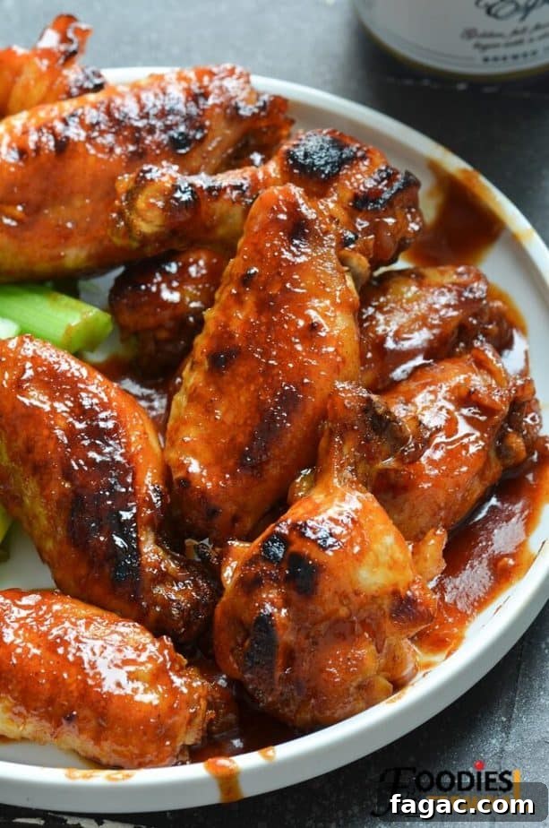 Sticky BBQ Chicken Wings in the Instant Pot 8 instant pot honey bbq chicken wings in a white plate