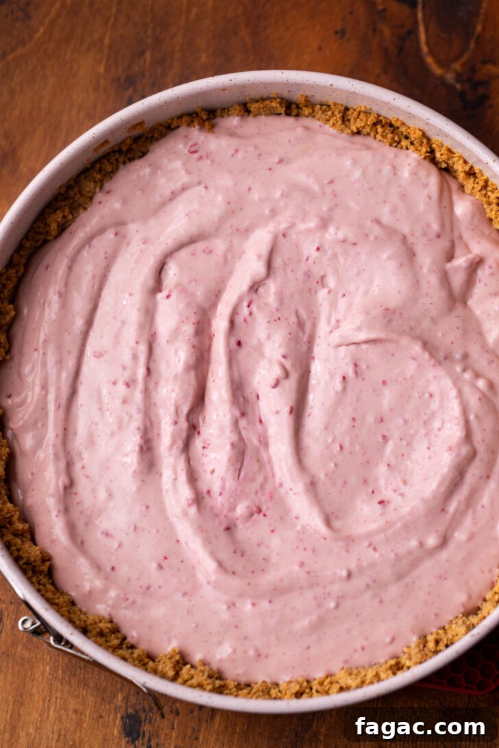 Decadent Raspberry Cheesecake Recipe 5 Cheesecake batter in the pan.