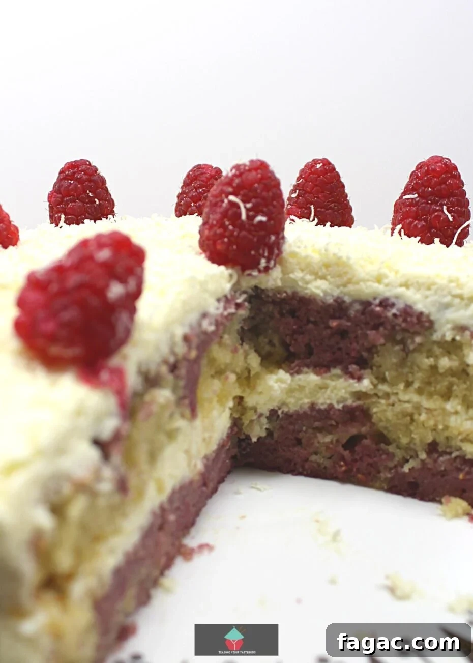 Raspberry Vanilla Marble Cake Recipe with Swirled Layers 3 Raspberry and Vanilla Marble Cake. A soft and moist marble cake bursting with delicious raspberry and vanilla flavors and a whipped cream vanilla frosting.