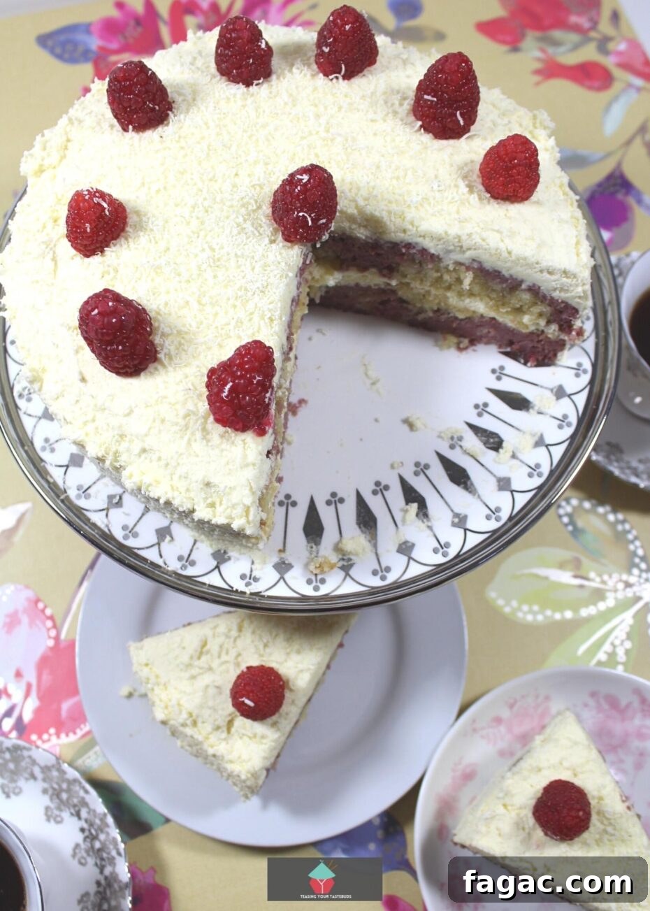 Raspberry Vanilla Marble Cake Recipe with Swirled Layers 4 Raspberry and Vanilla Marble Cake. A soft and moist marble cake bursting with delicious raspberry and vanilla flavors and a whipped cream vanilla frosting.