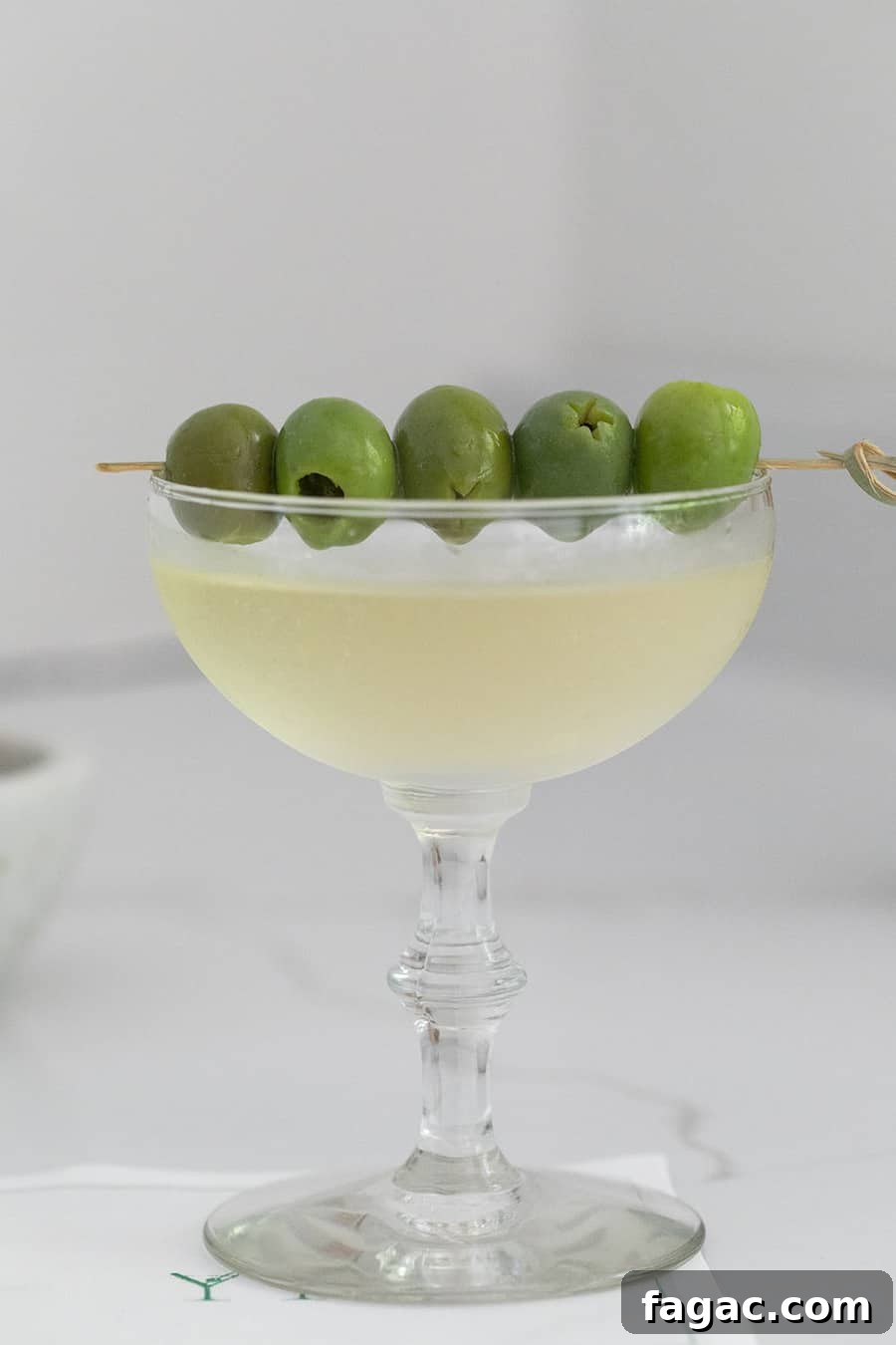 Dirty Martini Recipe: Tips for the Classic Cocktail 7 Easy dirty martini recipe with extra olives.