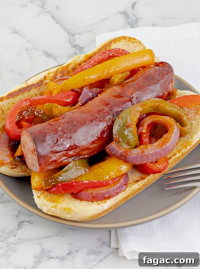 Crispy Sheet Pan Polish Sausage Sandwiches 10 sideways view of sausage sandwich