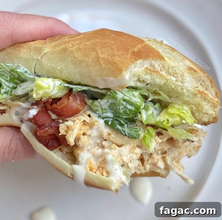 Slow Cooker Crack Chicken Sandwiches with Bacon and Cheese 5 Easy Slow Cooker Shredded Chicken Sandwiches (made with cream cheese, cheddar, ranch, bacon and lettuce!)