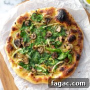 Garlic & Fennel Mushroom Pizza adapted from the original recipe and baked on Baking Steel.